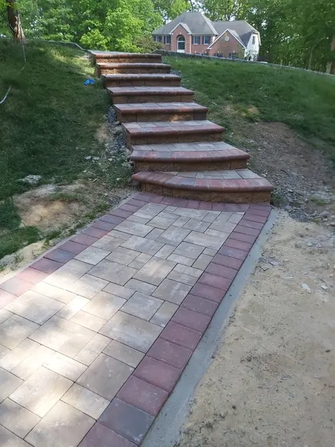 Paver walkway with block steps up the slope